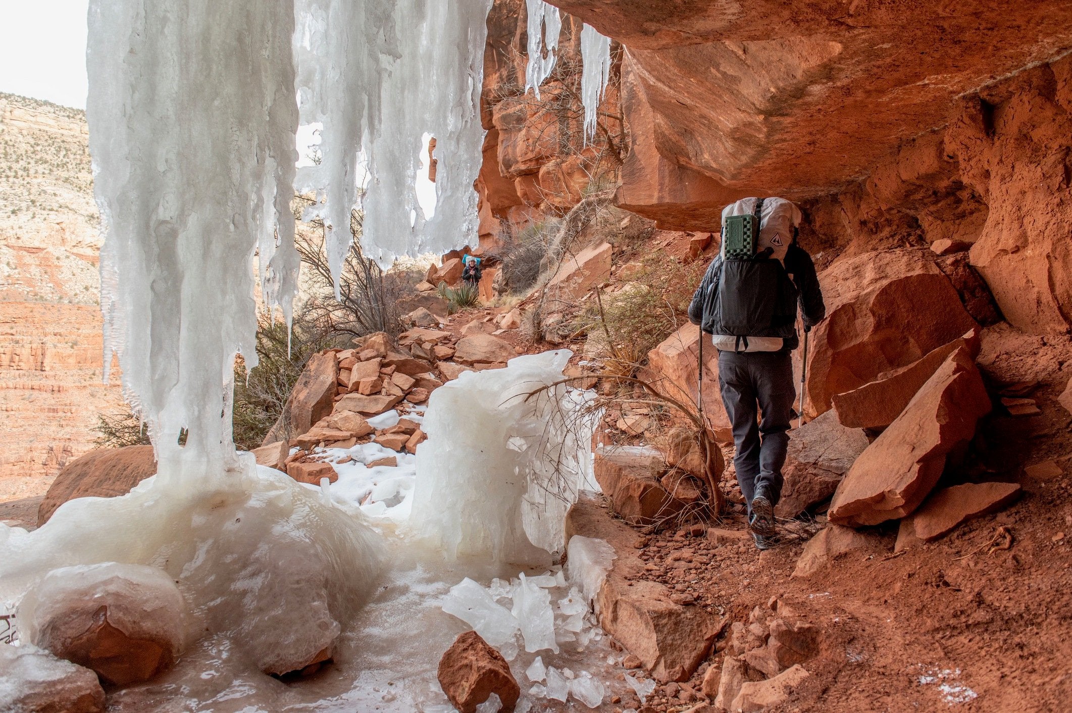 hiking under the overhanging icicles