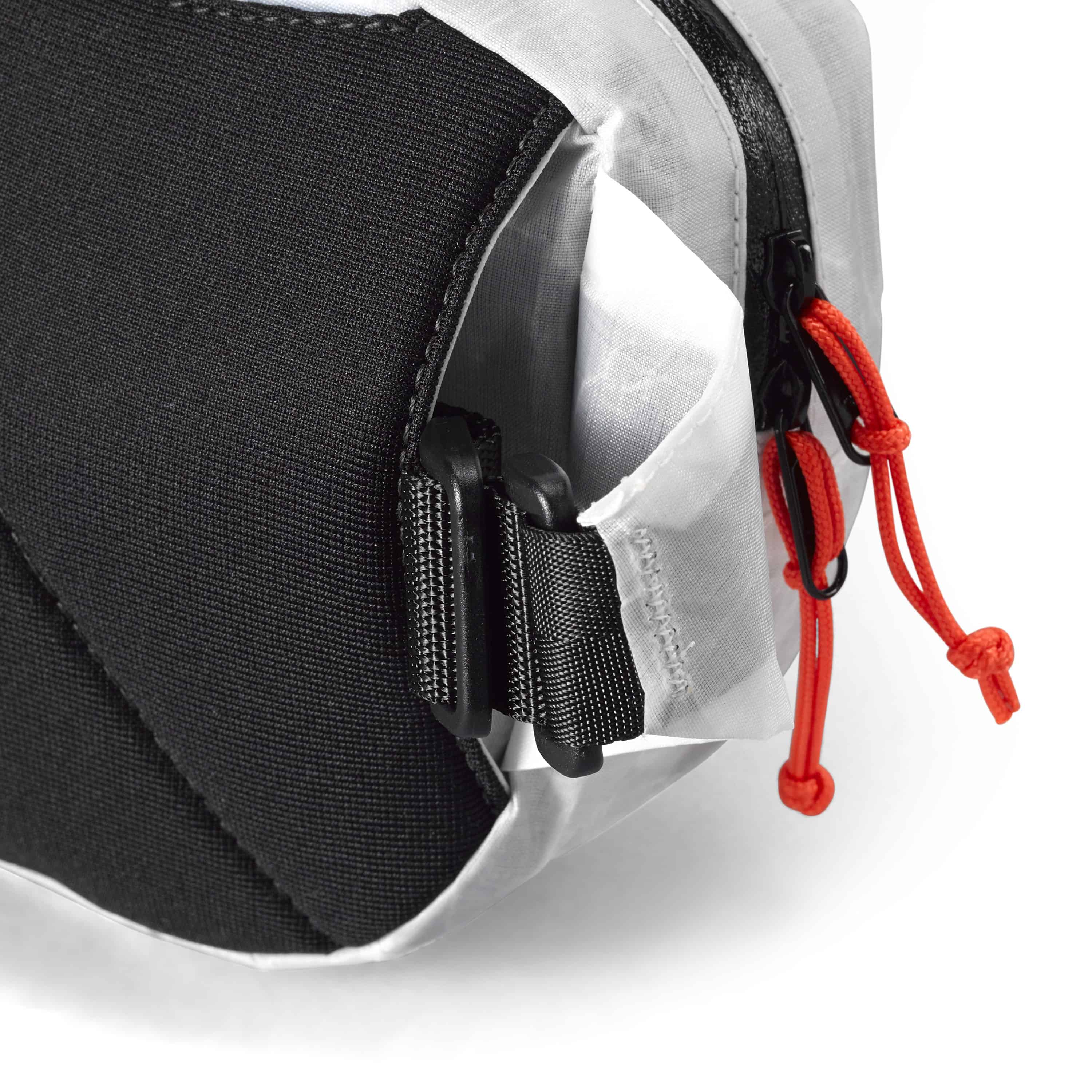 Detail shot of the strap and zippers on Hyperlite Mountain Gear's Versa in White