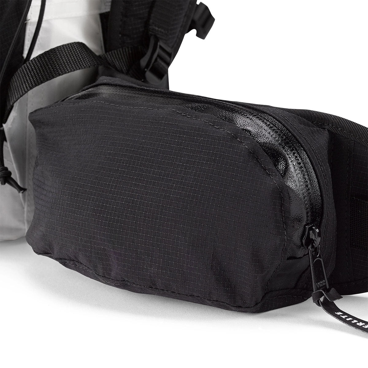 Close up of the side pockets on the 100D Dyneema® Gridstop Removable Hip Belt on the Hyperlite Mountain Gear Waypoint 35