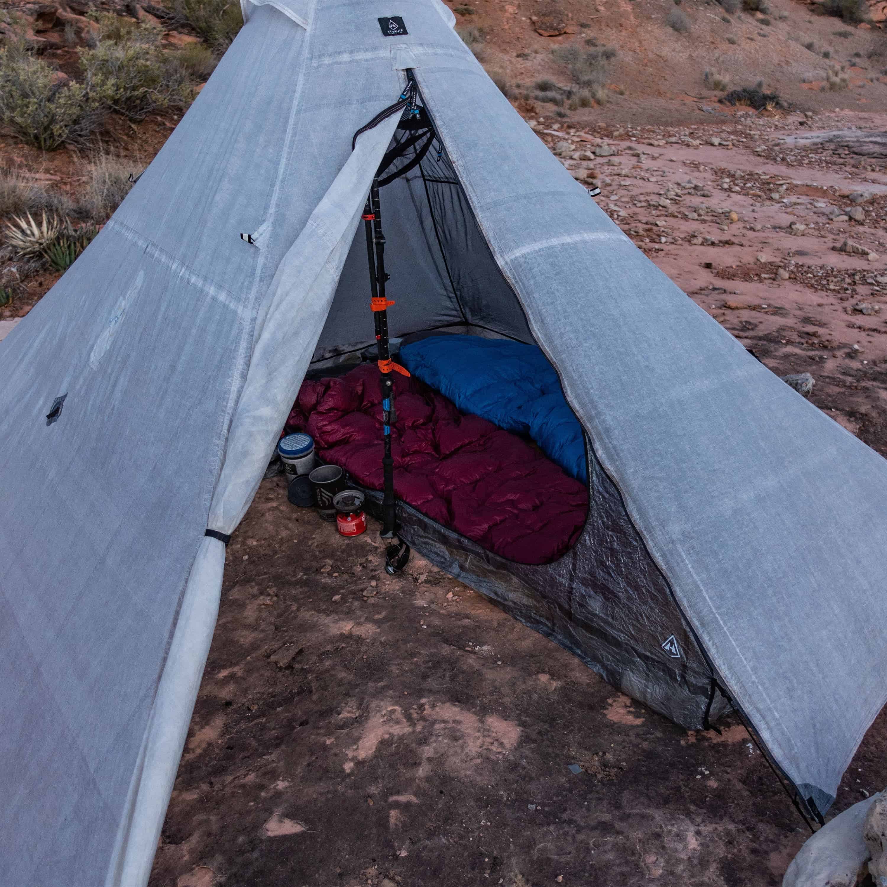 Front view of a campers UltaMid 4 Half Insert Paired with Ultamid 4 Pyramid Tent