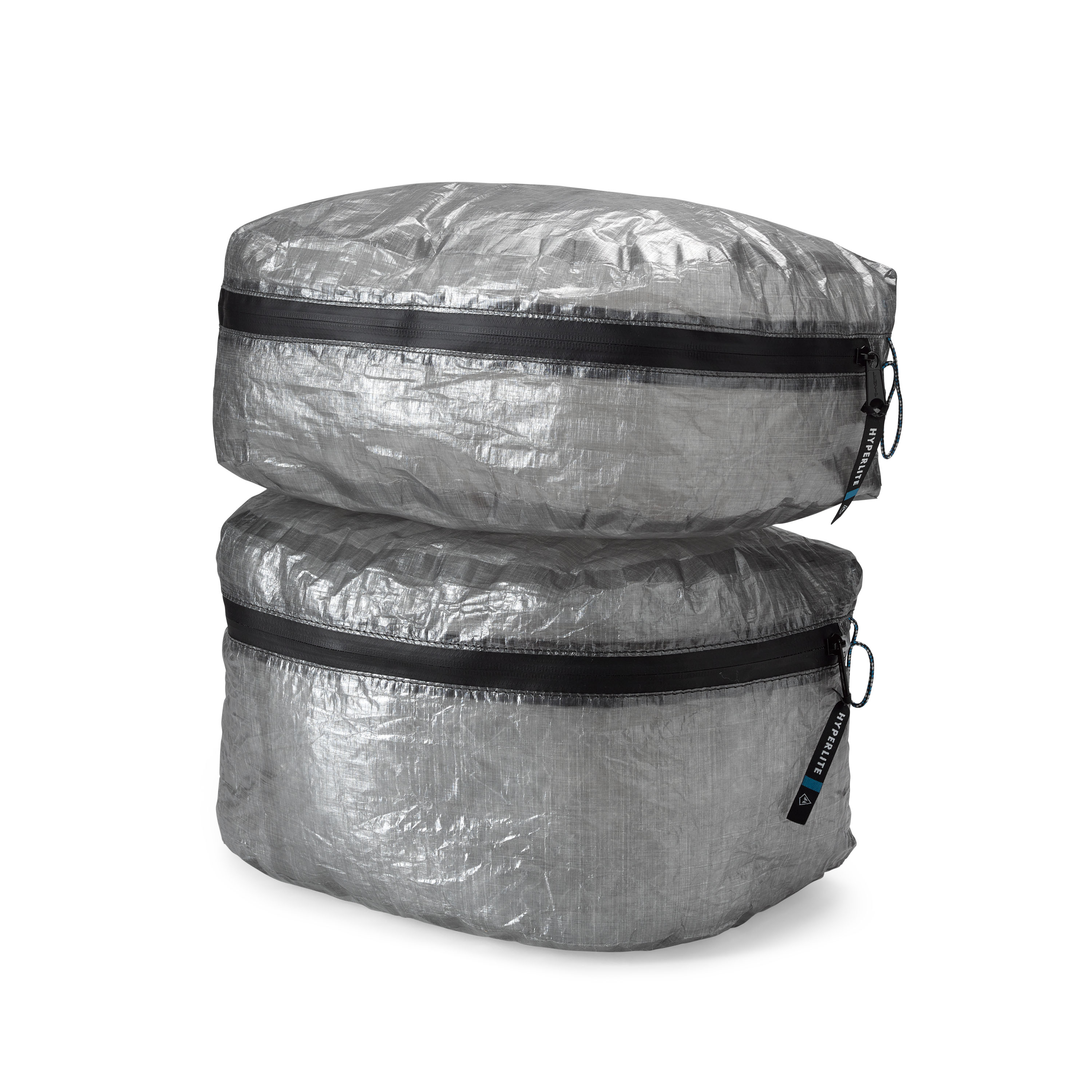 Front view of two different sizes of the Hyperlite Mountain Gear Pods designed with a clamshell design