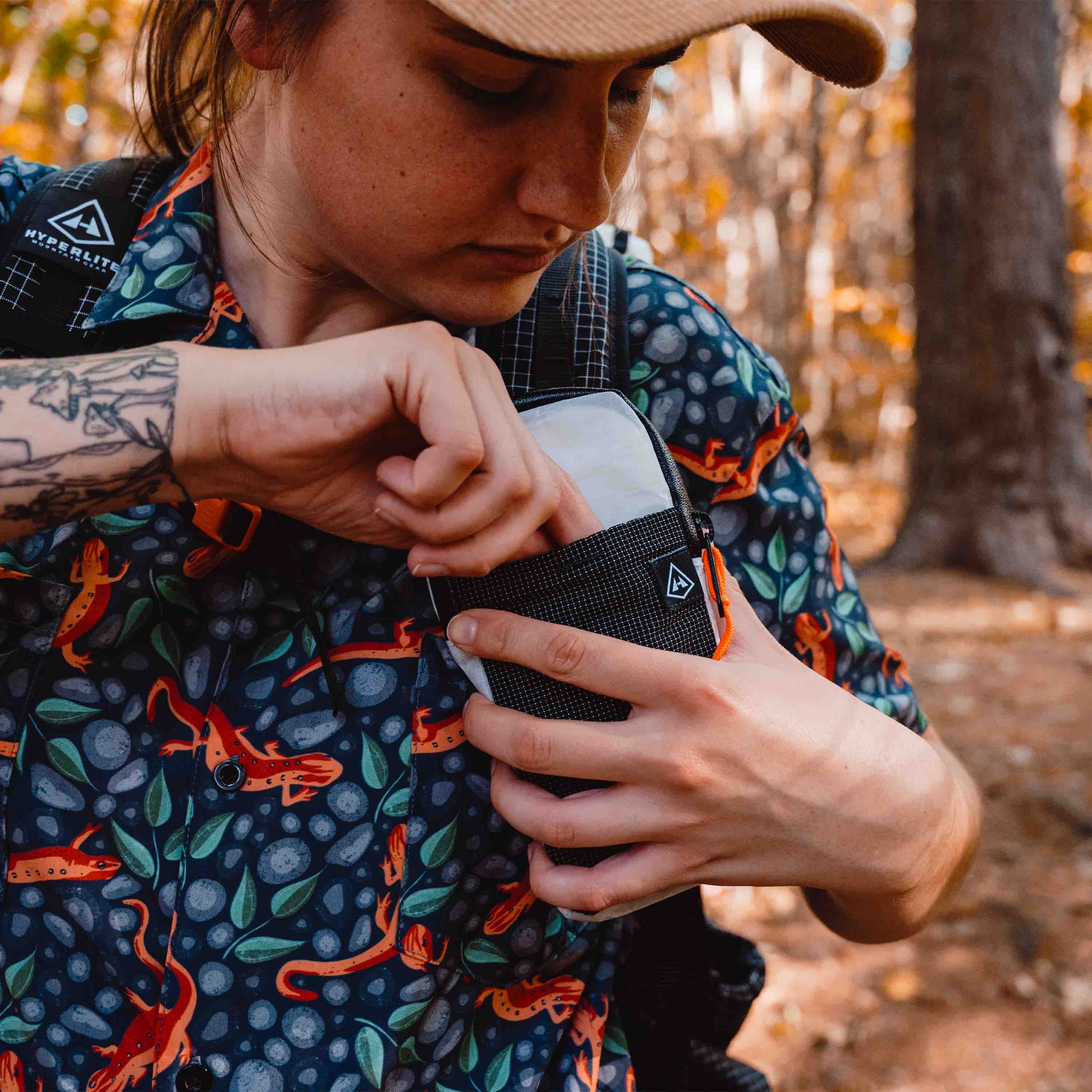 In use shot of Hyperlite Mountain Gear's Shoulder Pocket in White