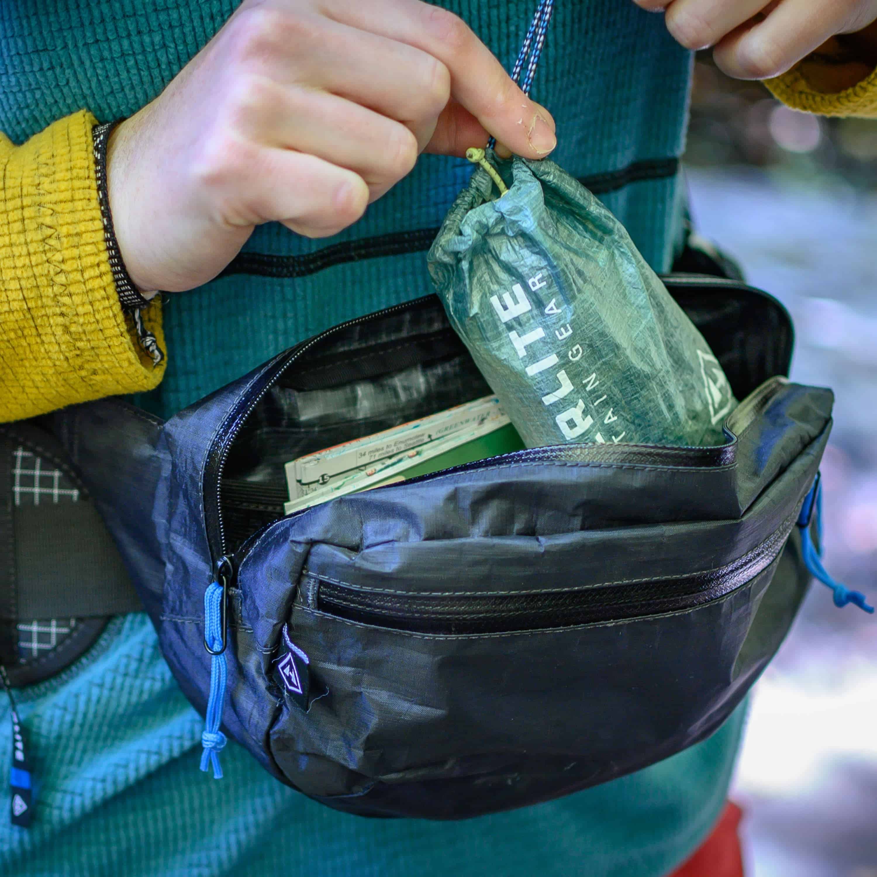 Hyperlite Mountain Gear's Versa in Black with Drawstring Stuff Sack inside