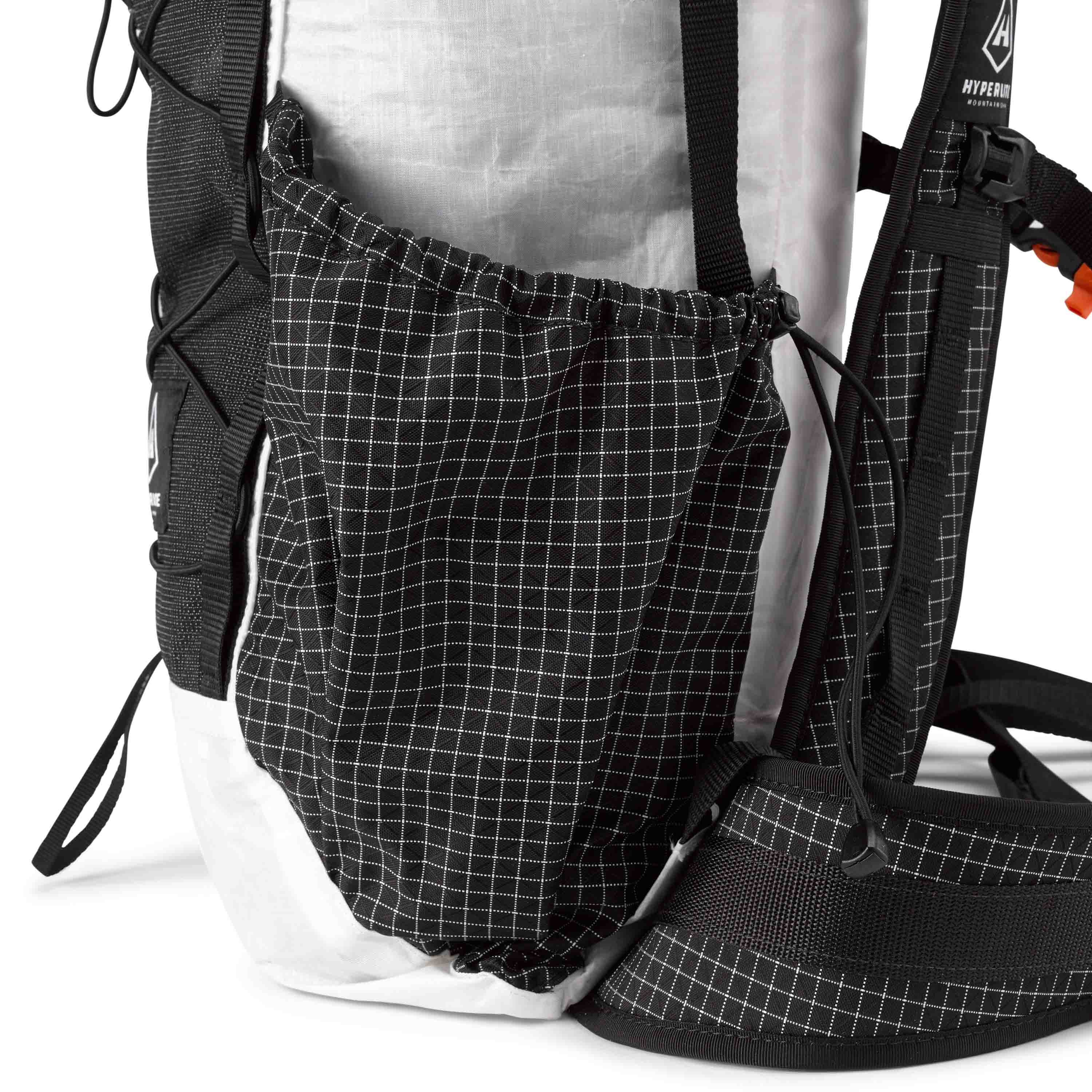 Cinchable hardline side pockets on the Hyperlite Mountain Gear Elevate 22