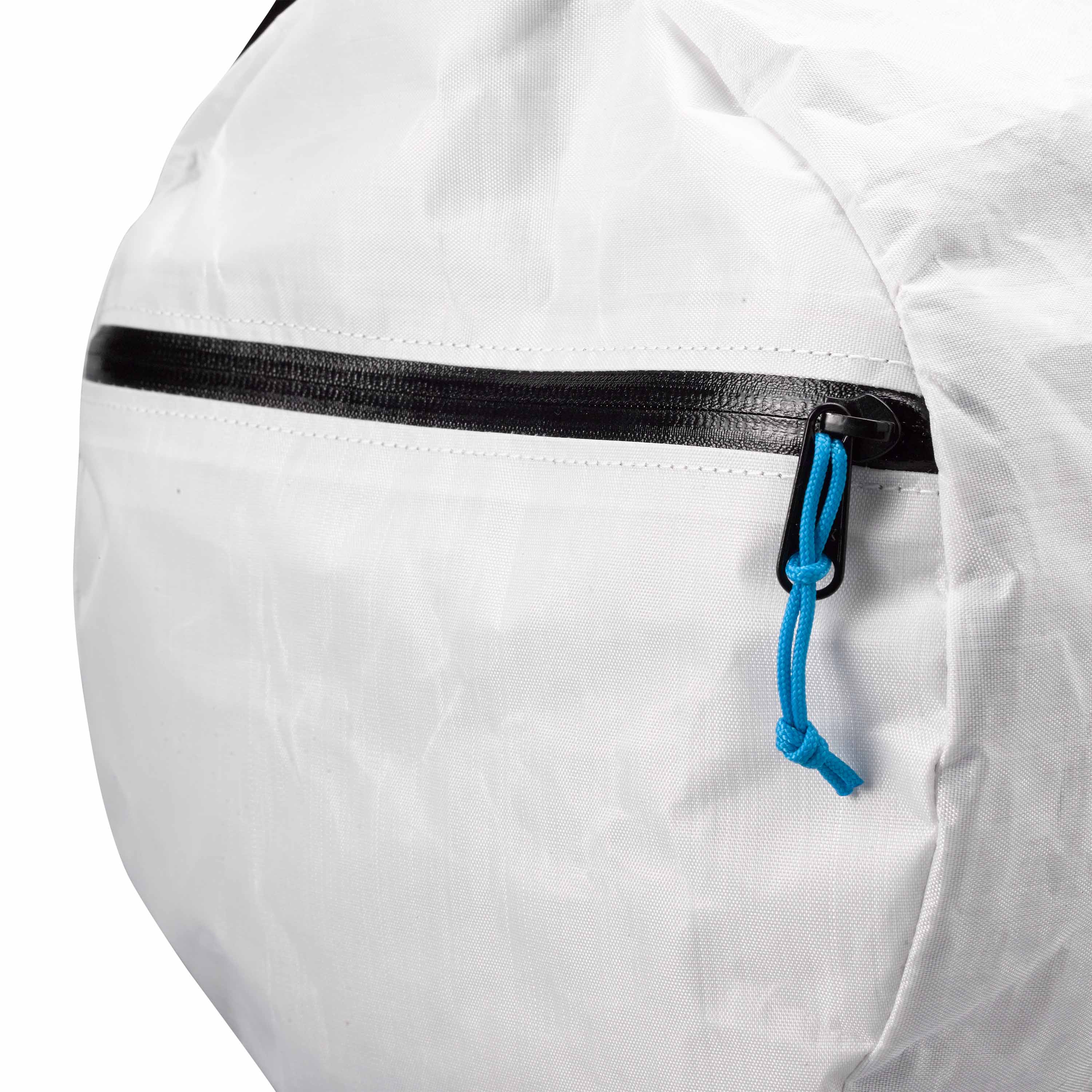 Side view of the Hyperlite Mountain Gear 30L Approach Duffel showing one of the #8 YKK AquaGuard Side Zippers