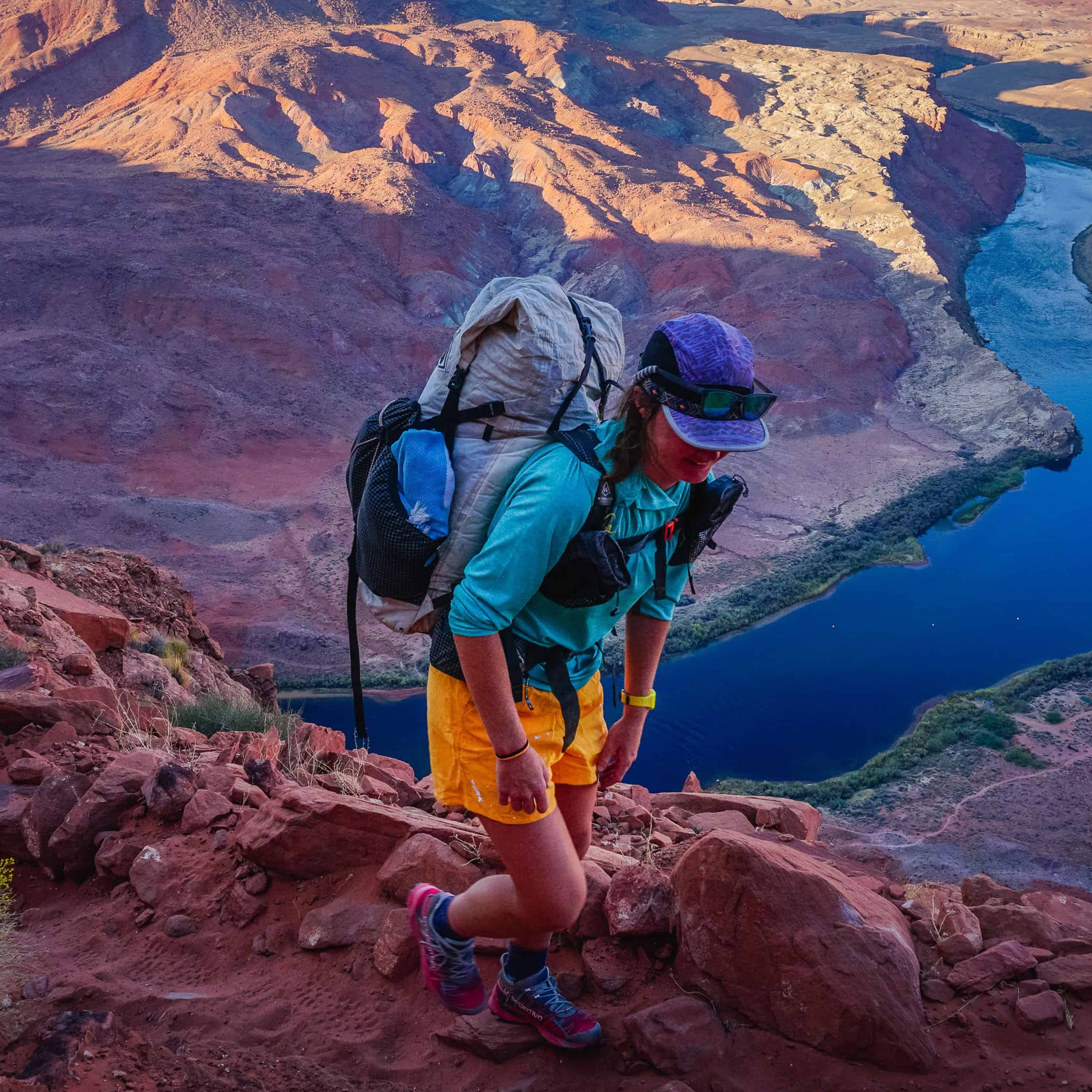 Hyperlite Mountain Gear's Southwest 70 Pack in White on a hikers back in the canyon 