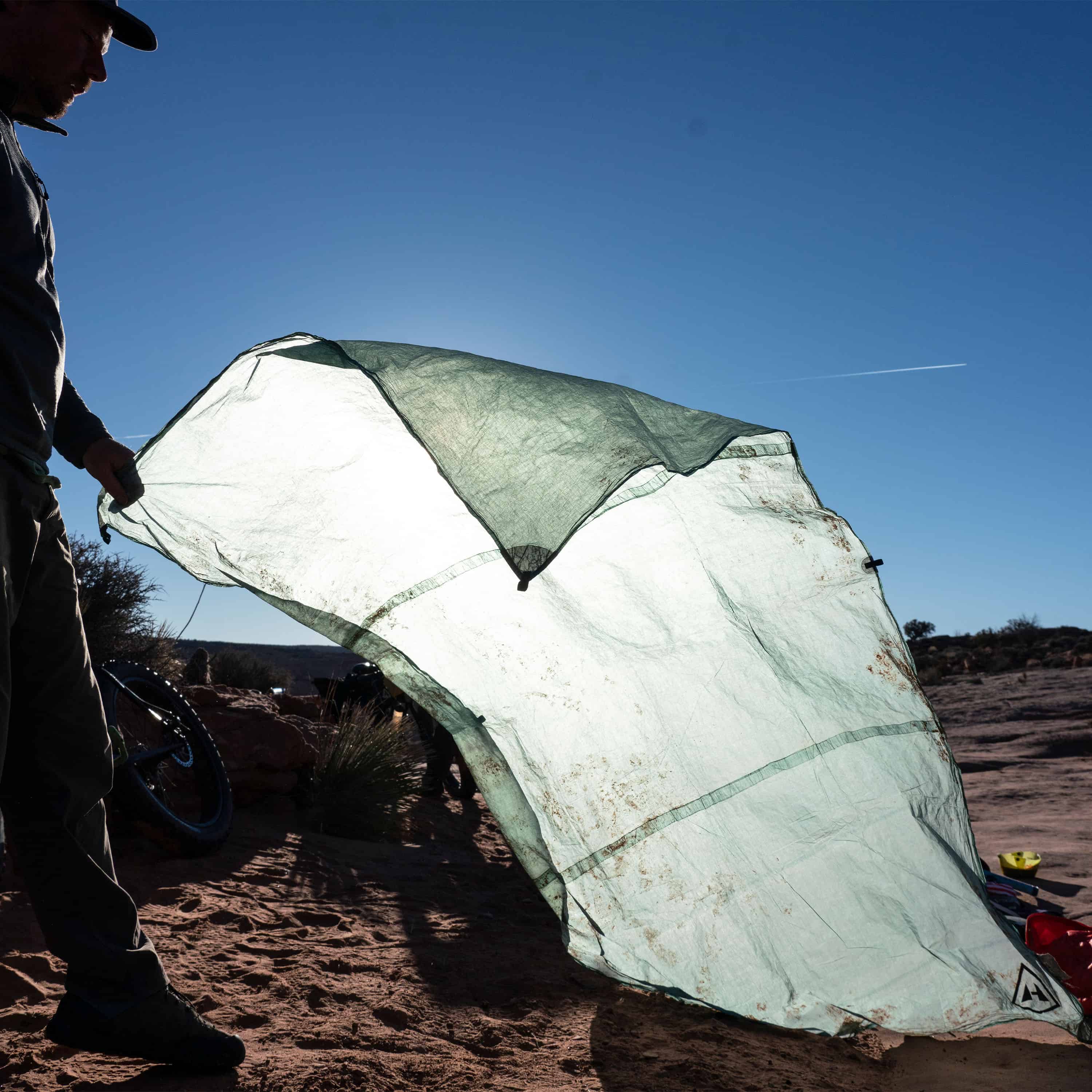 Hyperlite Mountain Gear's Ground Cloth being set up on a mountain top