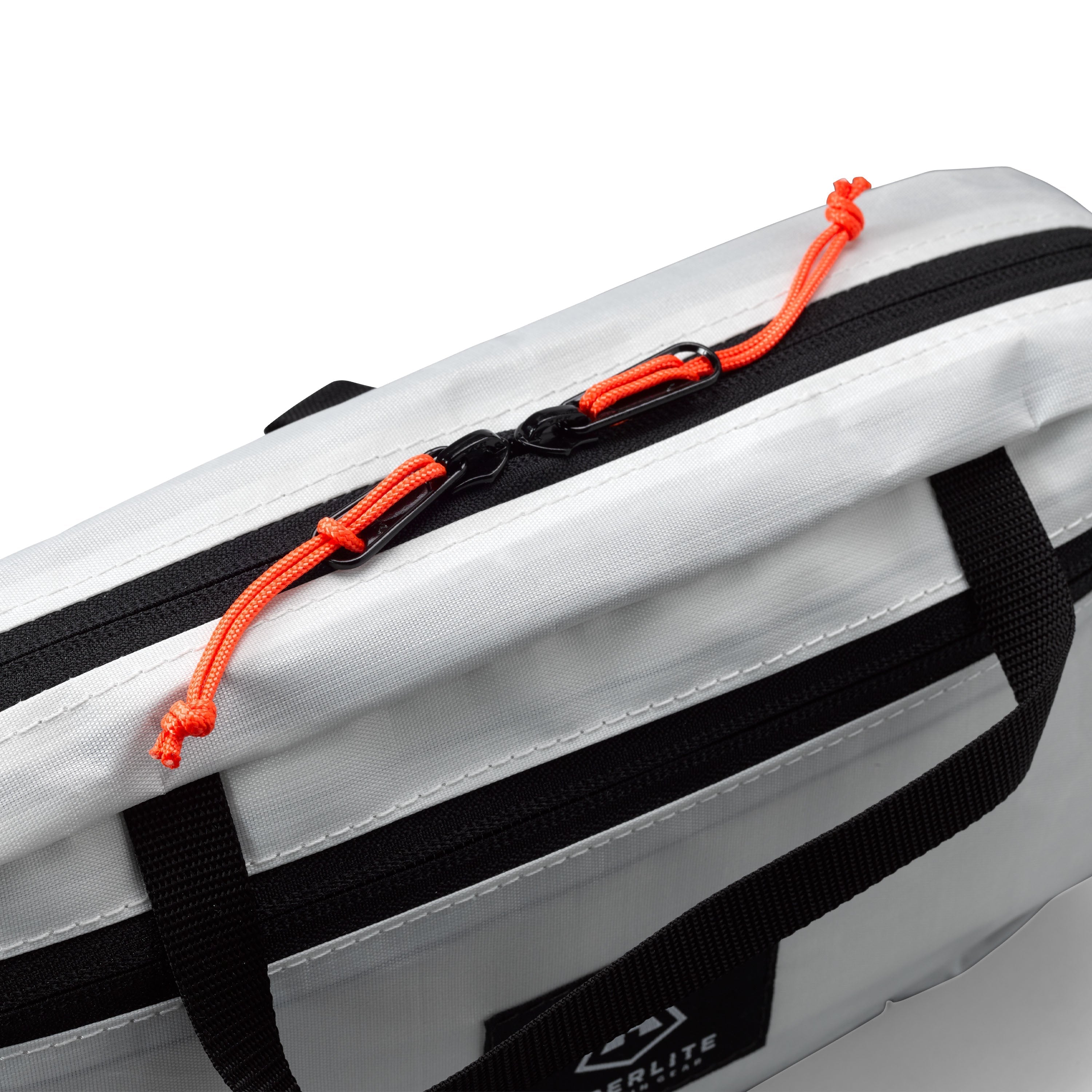 Detail shot of zippers and hang loop on Hyperlite Mountain Gear's Prism Ice Screw Case in White