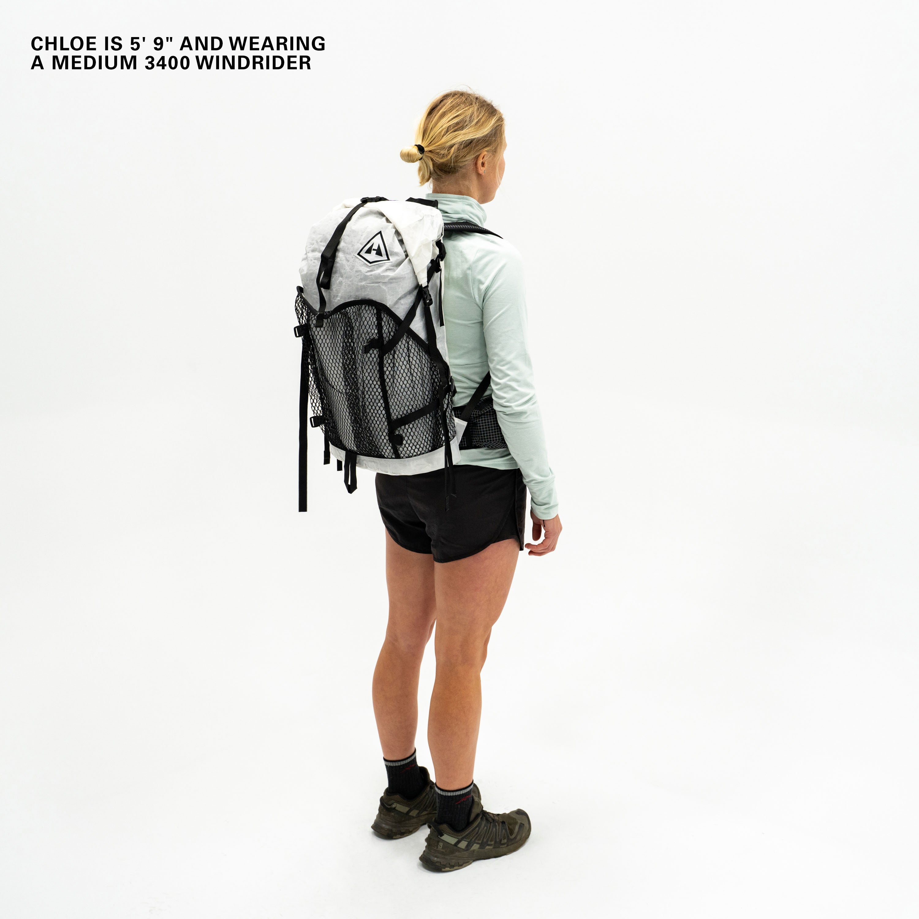 Left side view of Hyperlite Mountain Gear's Windrider 40 Pack in White on model 