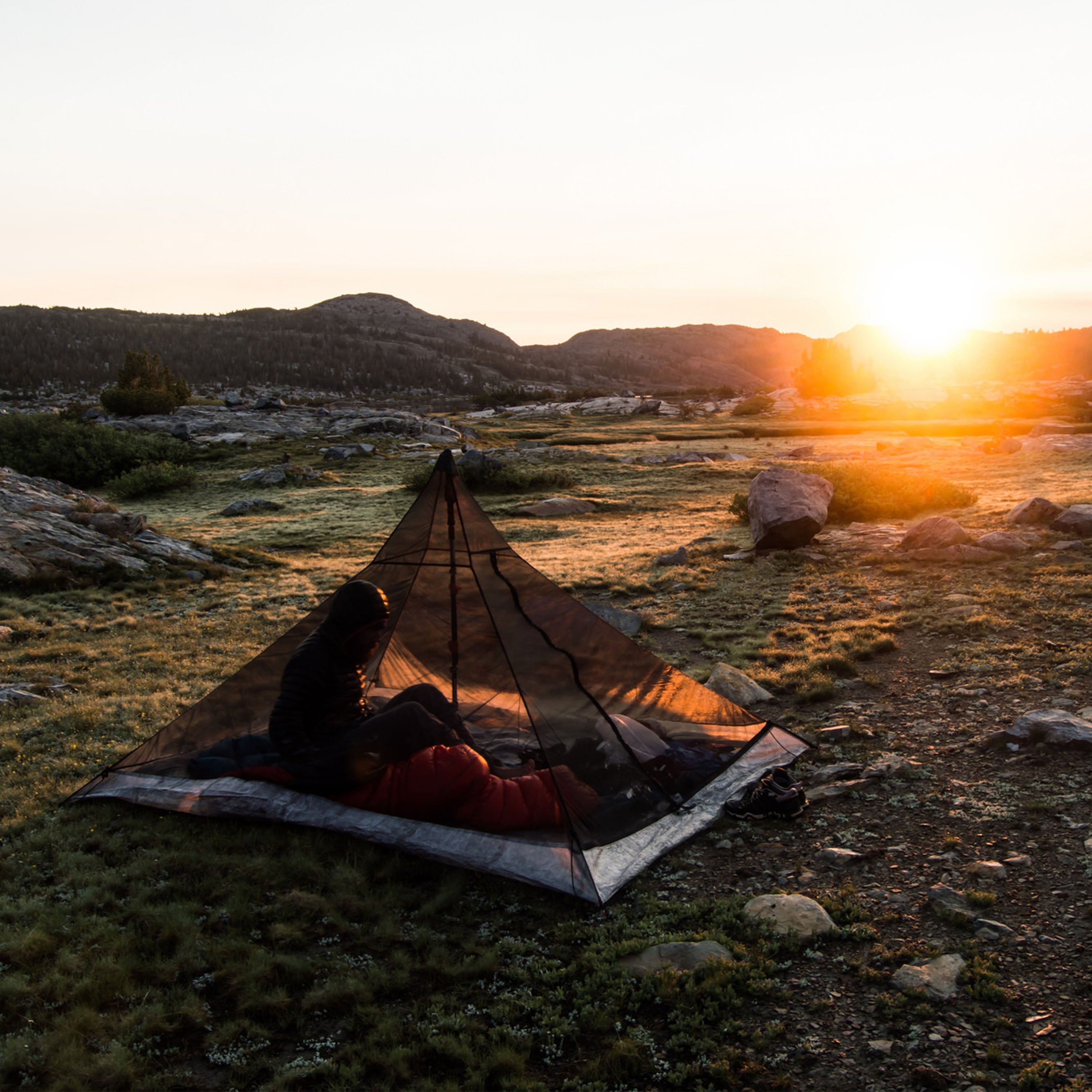 Exterior rear view Hyperlite Mountain Gear Shelters UltaMid 2 Insert with DCF11 Floor without tent in a desert landscape overlooking a sunset