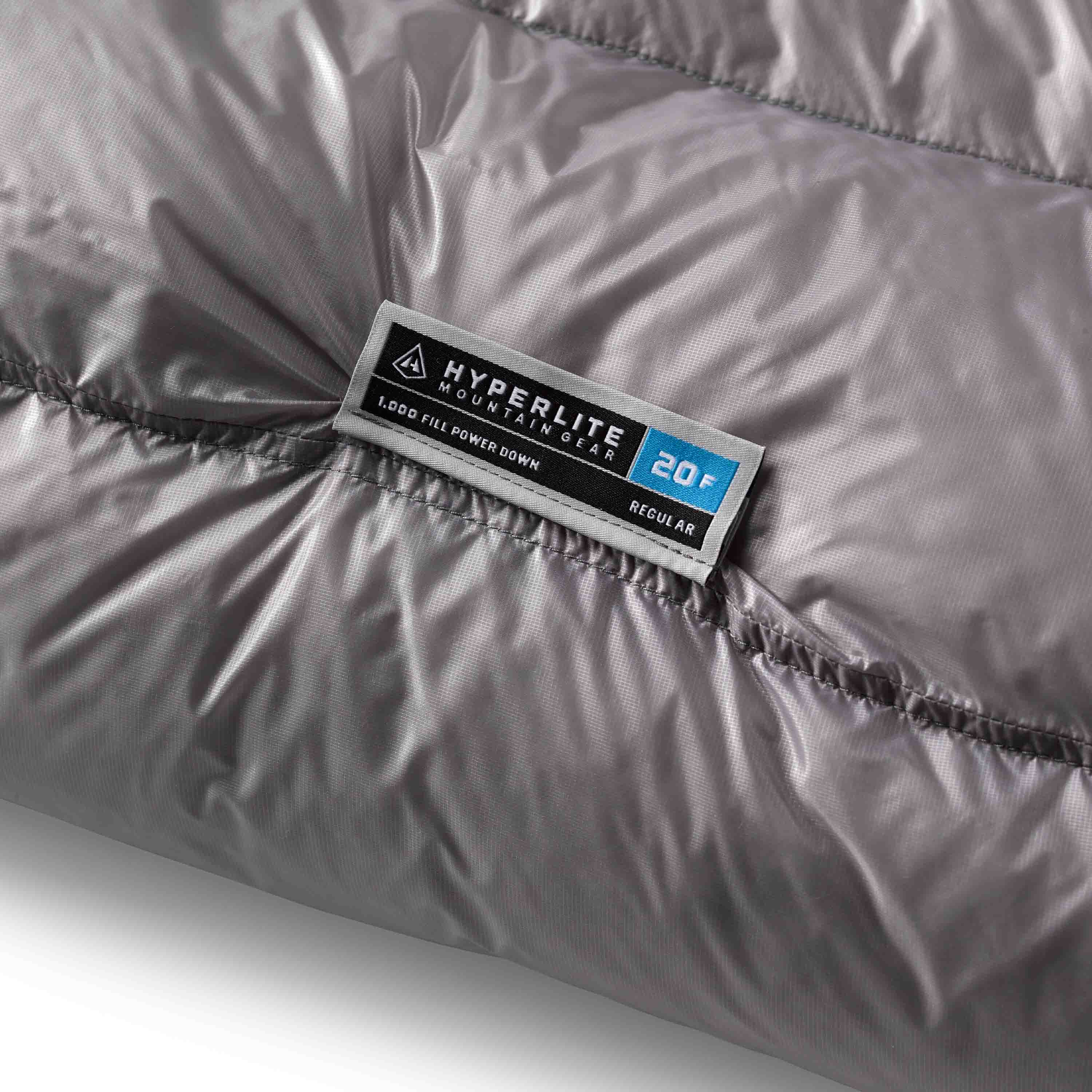 Hyperlite Mountain Gear 20-Degree Quilt showing the sewn on Hyperlite tag